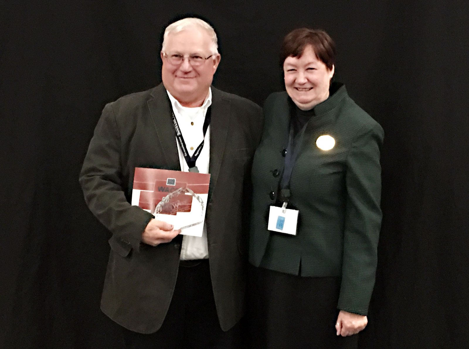 WACCT Professional Employee of the Year Stan Nicolls with EWC President Dr. Lesley Travers.