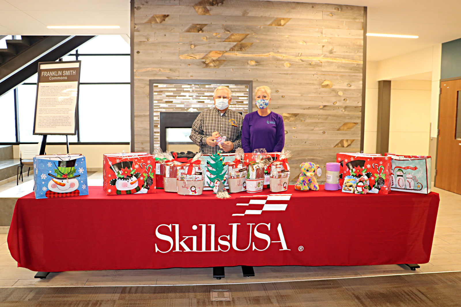 L-R Stan Nicolls, EWC SkillsUSA Sponsor and Aleata Sittner, TLC, with the gifts that were given to TLC from the EWC SkillsUSA members.