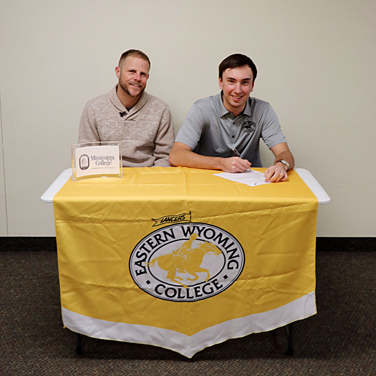 - Tomas Kubata and Coach Zach Smith as Kubata signs his national letter of intent to play at Mississippi College.