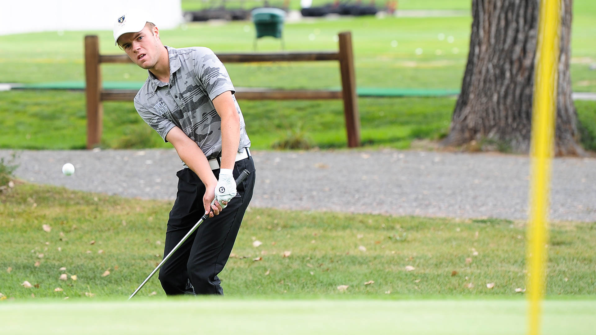  Eastern Wyoming College’s Oscar Behle hits the ball onto the green Thursday during the Regional IX Golf Tournament Thursday, Sept. 15 at Cottonwood Golf Course in Torrington, Wyoming. Behle finished in third place with a -2.